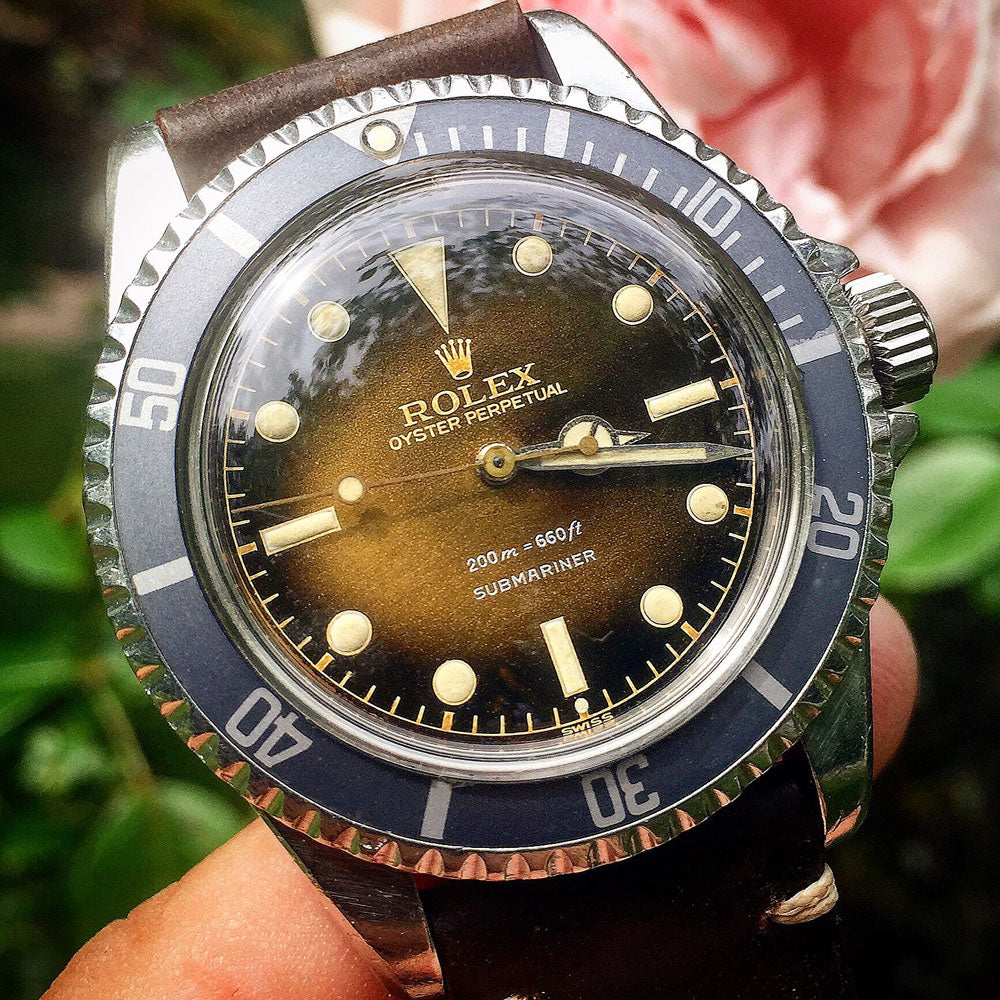 Vintage Rolex and Omega- The Tropical Dial Explained